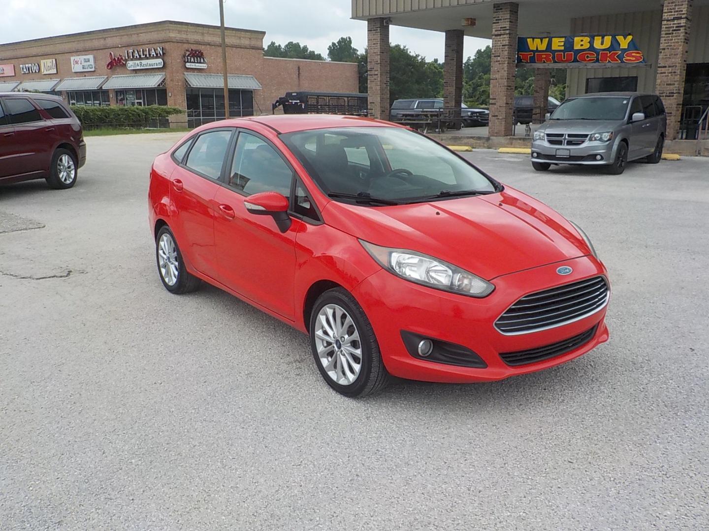 2014 Red /Charcoal Ford Fiesta (3FADP4BJ0EM) , Automatic transmission, located at 1617 W Church Street, Livingston, TX, 77351, (936) 327-3600, 30.710995, -94.951157 - WOW!! Need to check this one out for the price range it's in! You won't be disappointed! - Photo#1